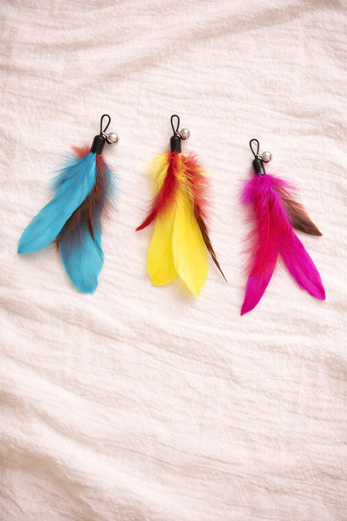 Three colourful feather cat toy attachments