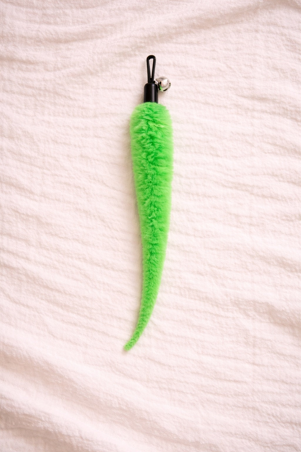 Green furry cat toy attachment with bell and clip connector
