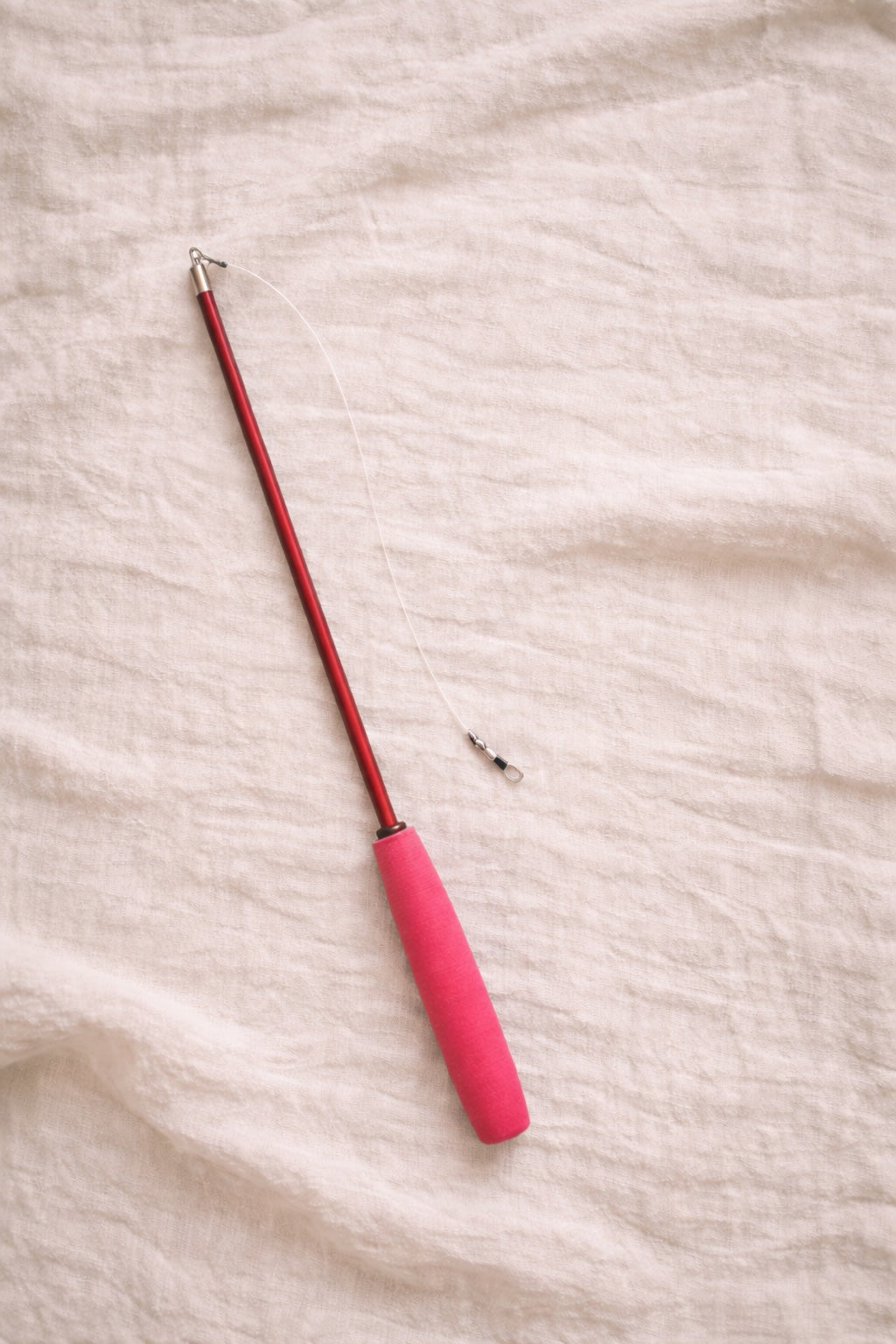 Pink cat wand toy with foam handle and modular connector